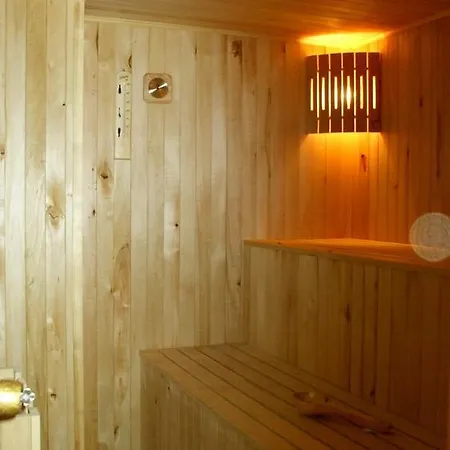 Ferienhaus Kotedzas Melnrageje